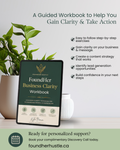 FoundHer Business Clarity Workbook on a table with a plant in the background